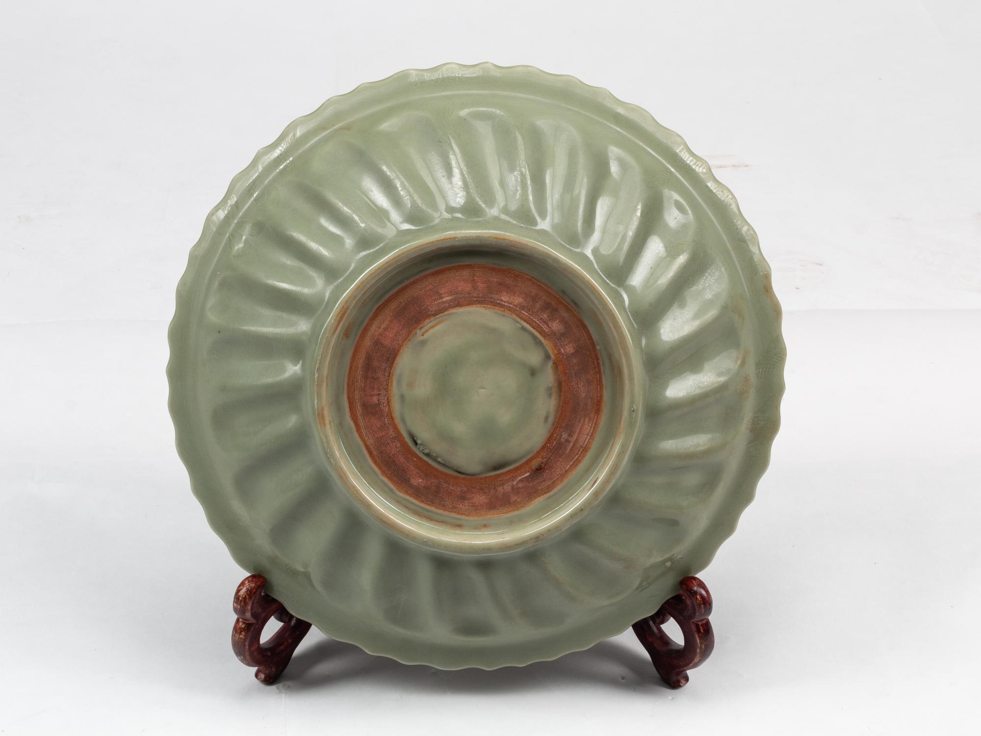 A Chinese Celadon Glazed Porcelain Charger