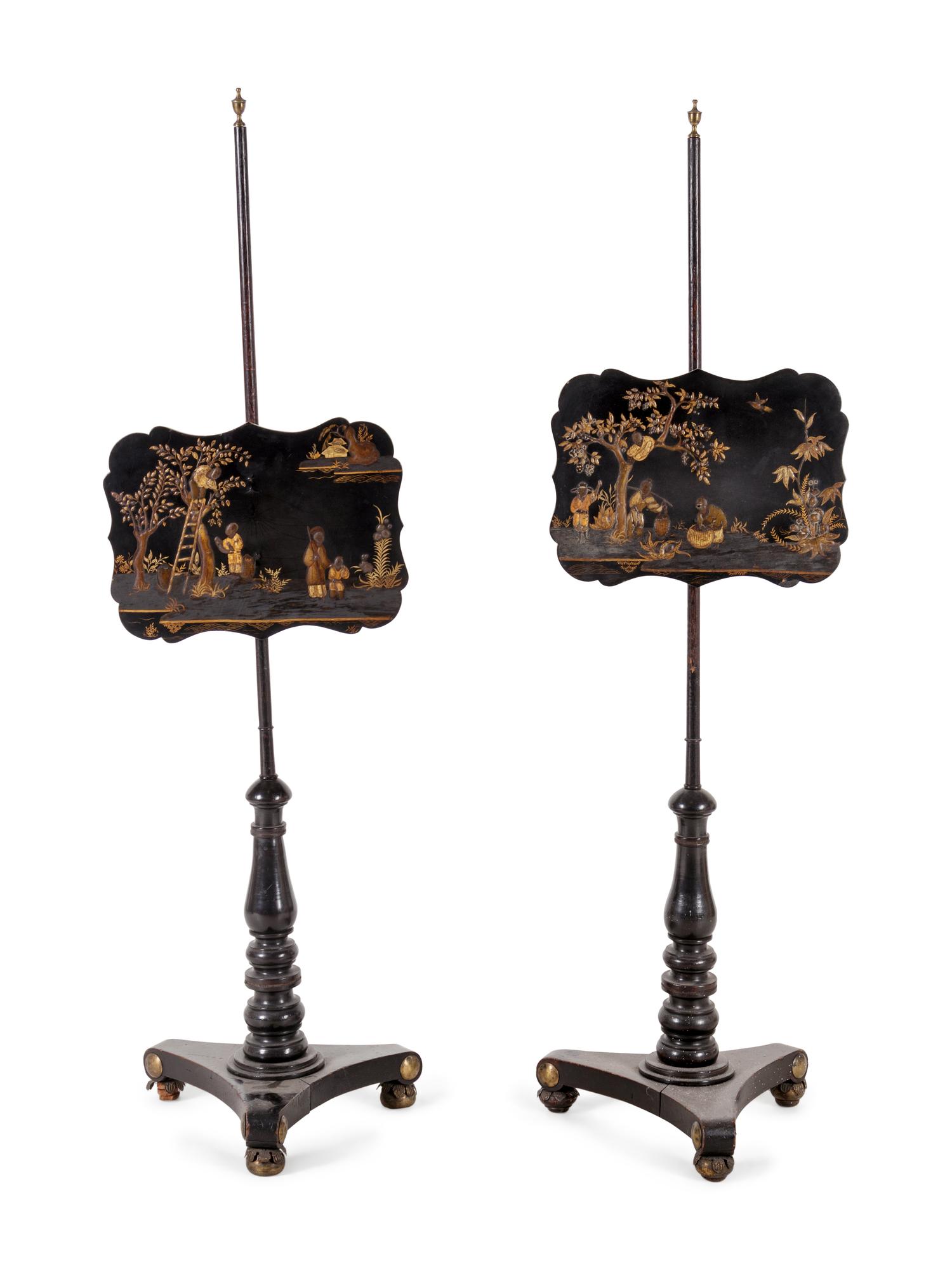 A Pair of Regency Black Lacquered and Chinoiserie Decorated Pole Screens