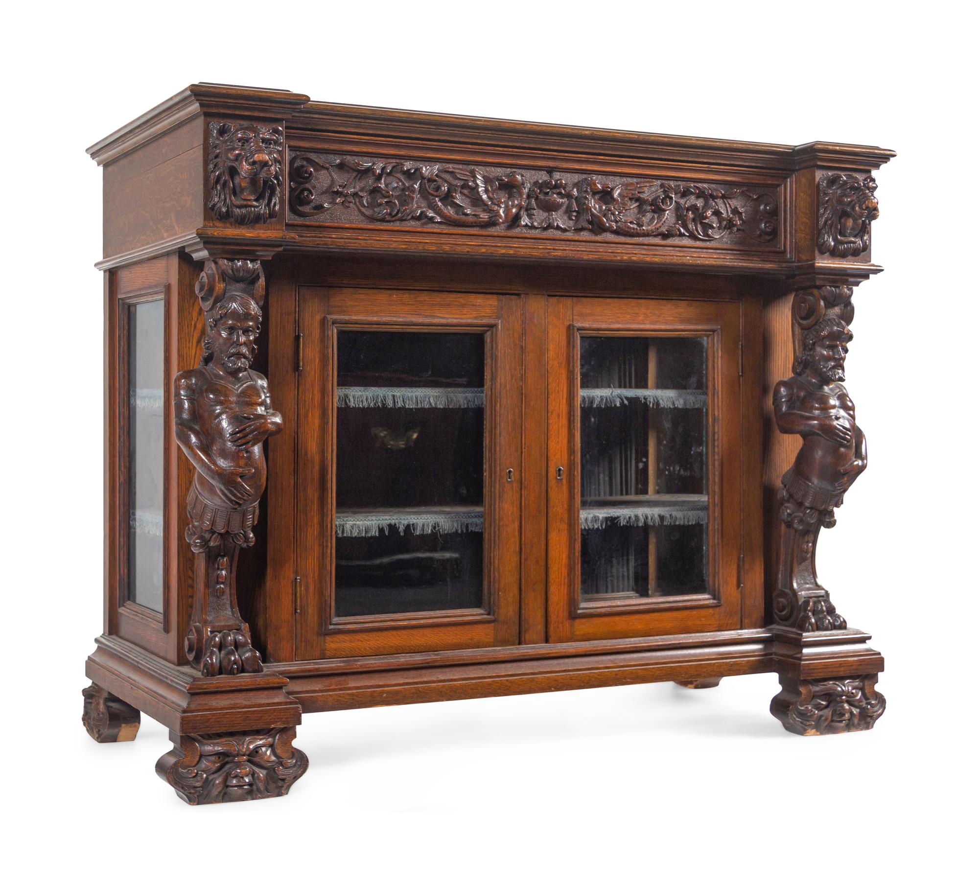 An R.J. Horner Carved Oak Man of the Mountain Serving Cabinet