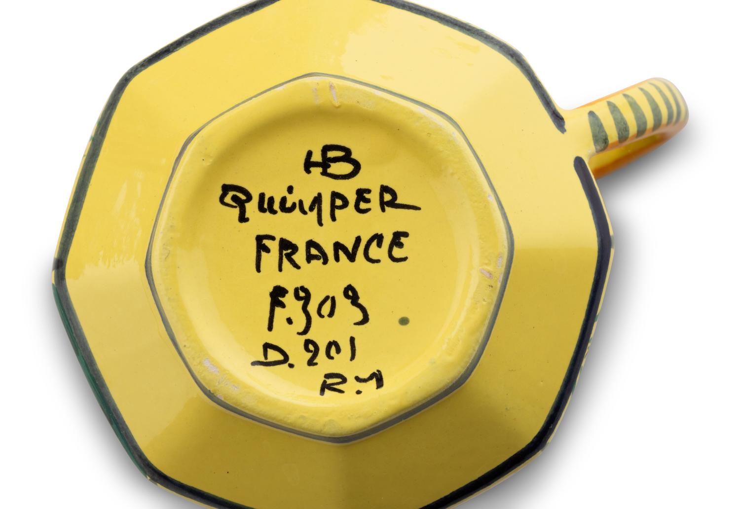 An Assembled Set of French Quimper Dinnerware