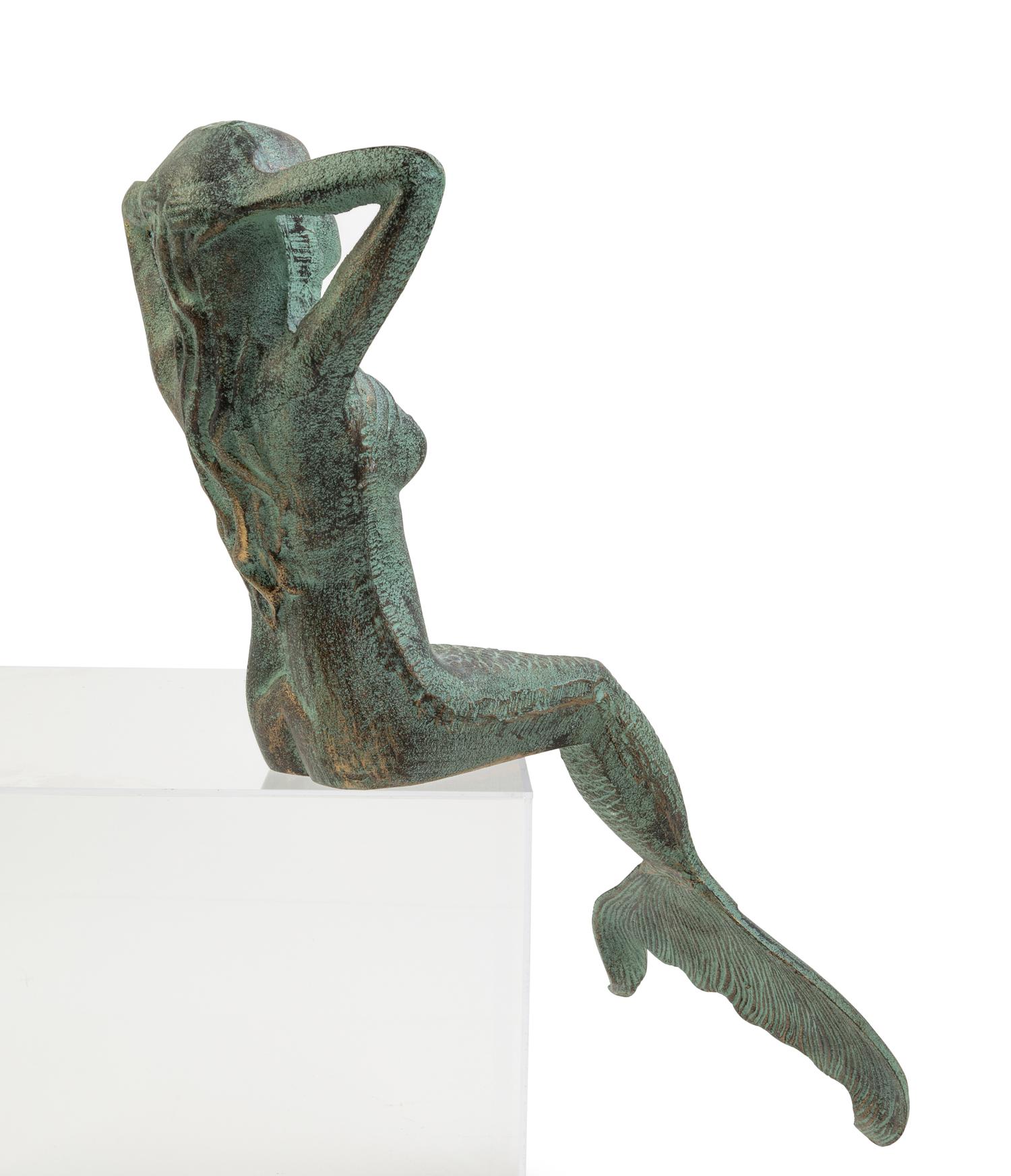 An Iron Figure of a Mermaid