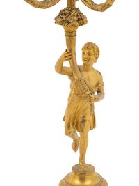 A Pair of French Gilt Bronze Figural Three-Light Candelabra