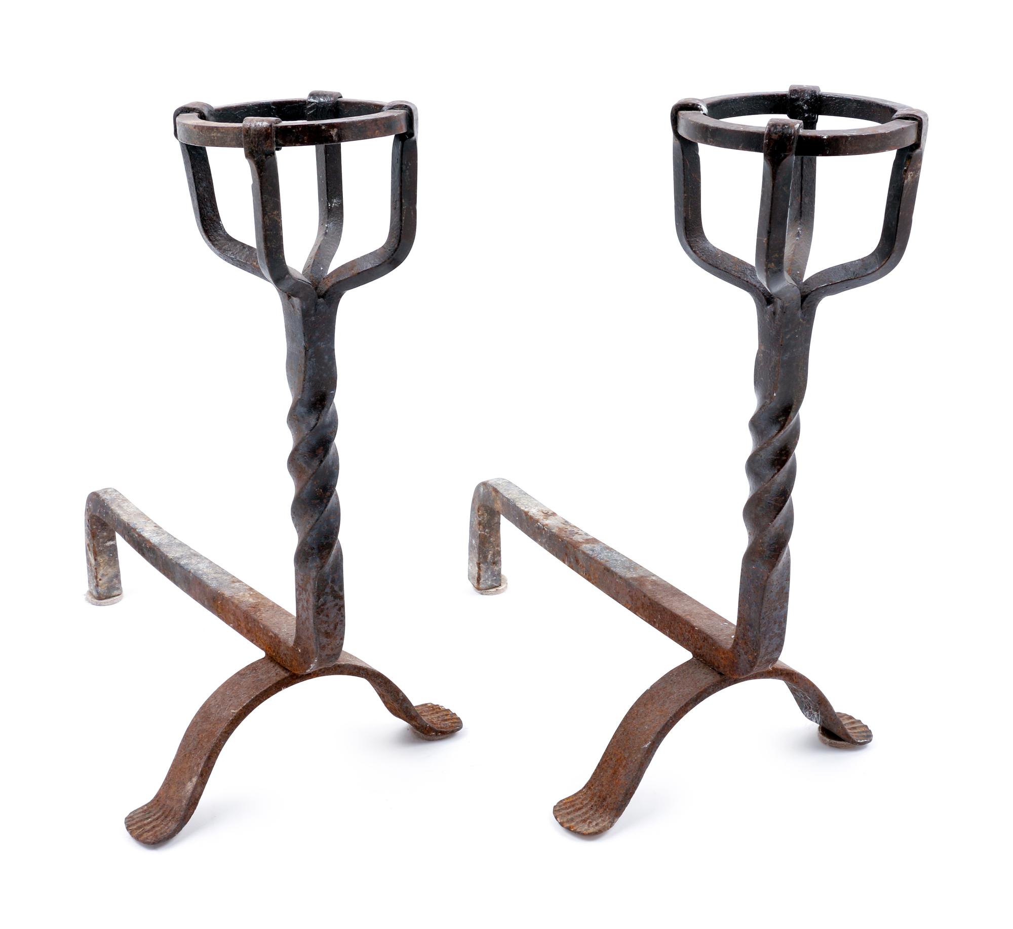 A Pair of Renaissance Revival Wrought Iron Andirons