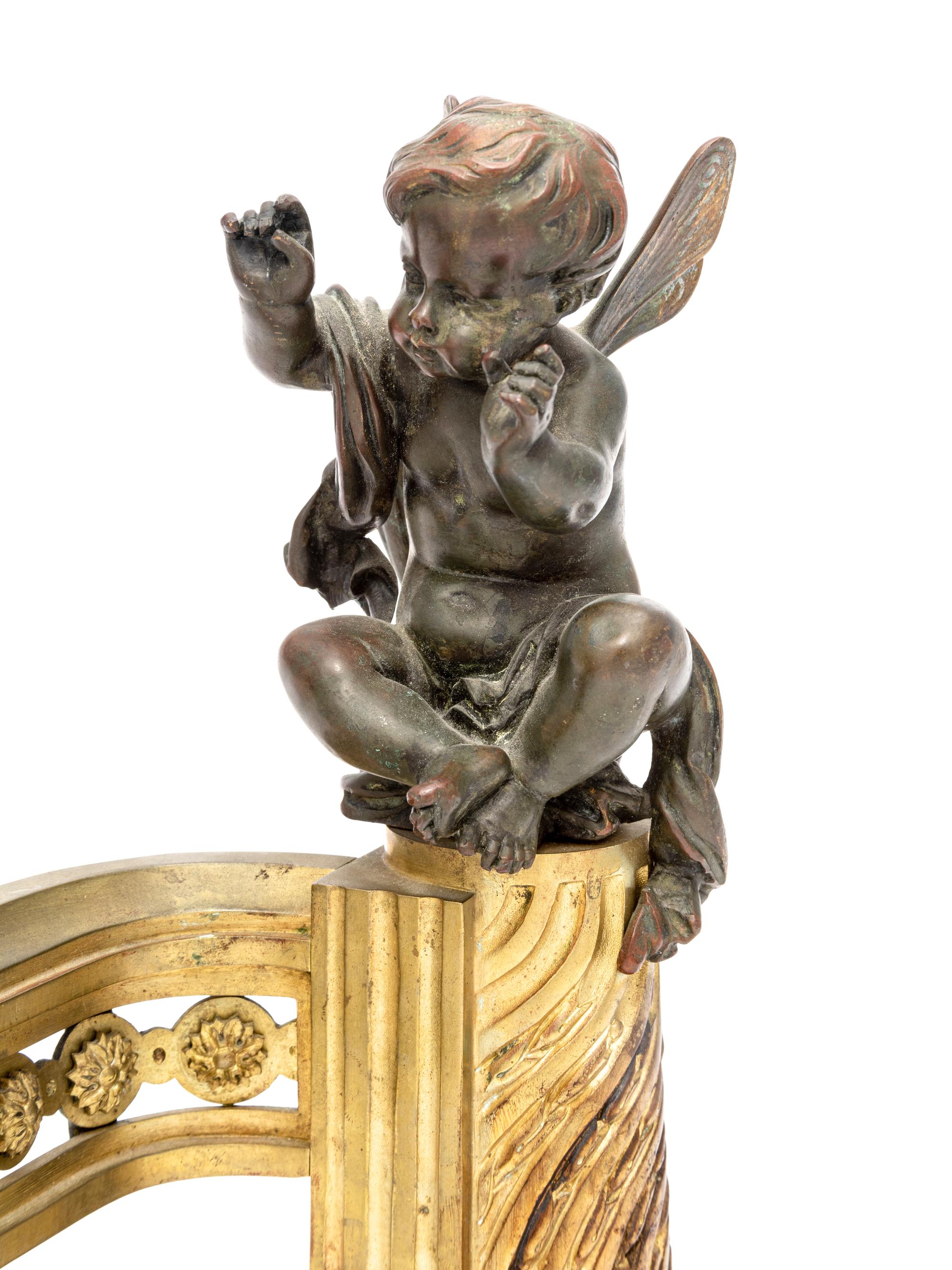 A Pair of French Gilt and Patinated Bronze Figural Chenets