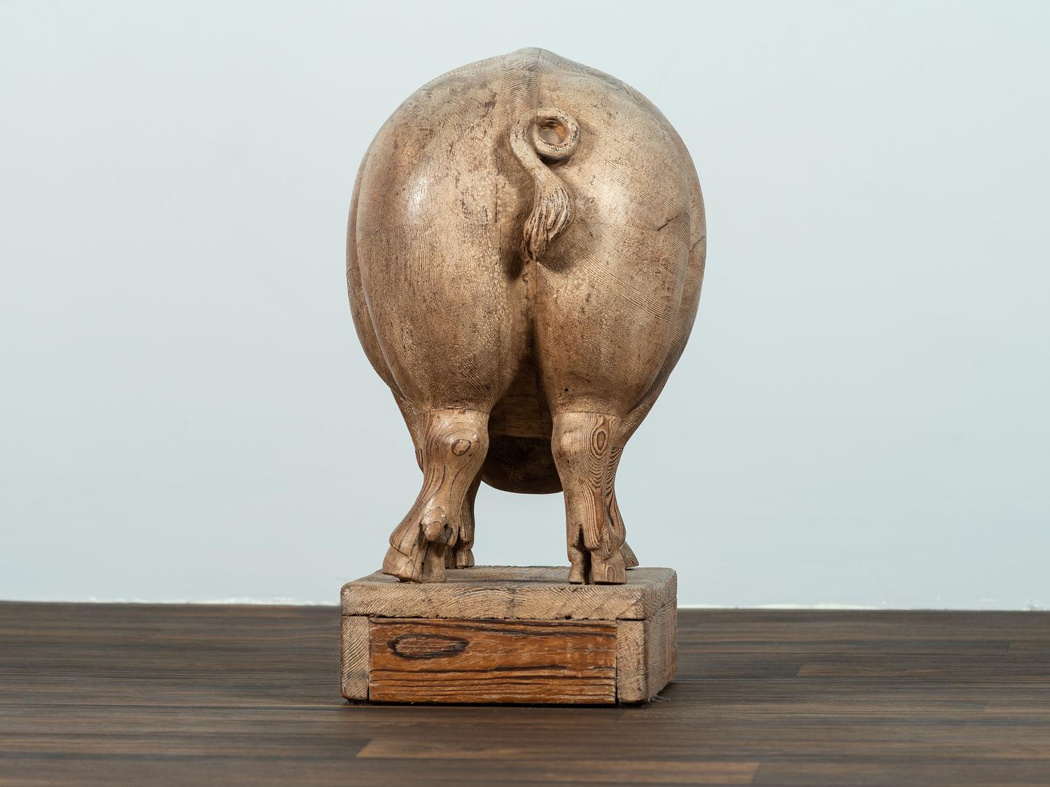 A Folk Art Carved Wood Figure of a Sow