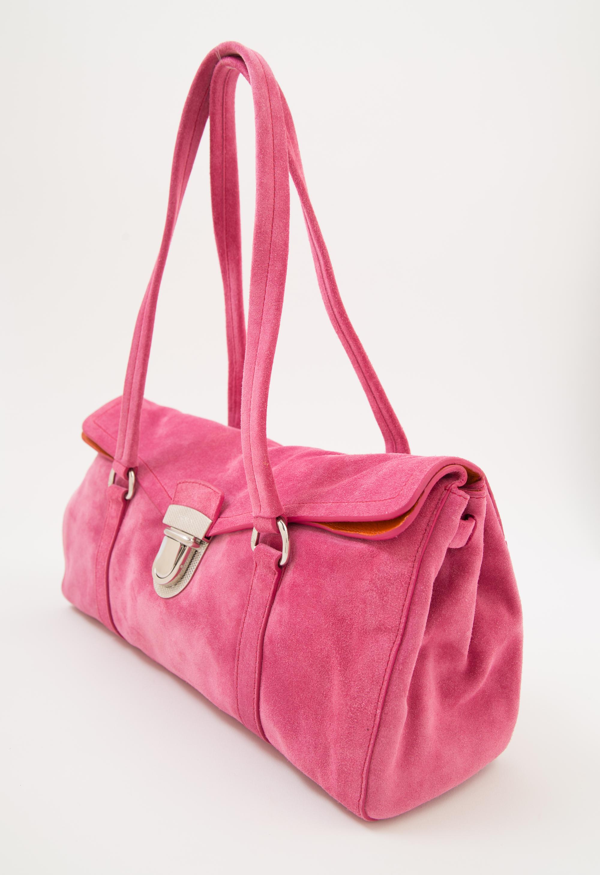 A Prada Pink Suede Handbag, 12.5" x 7.5" x 4.5"; Strap drop: 9".