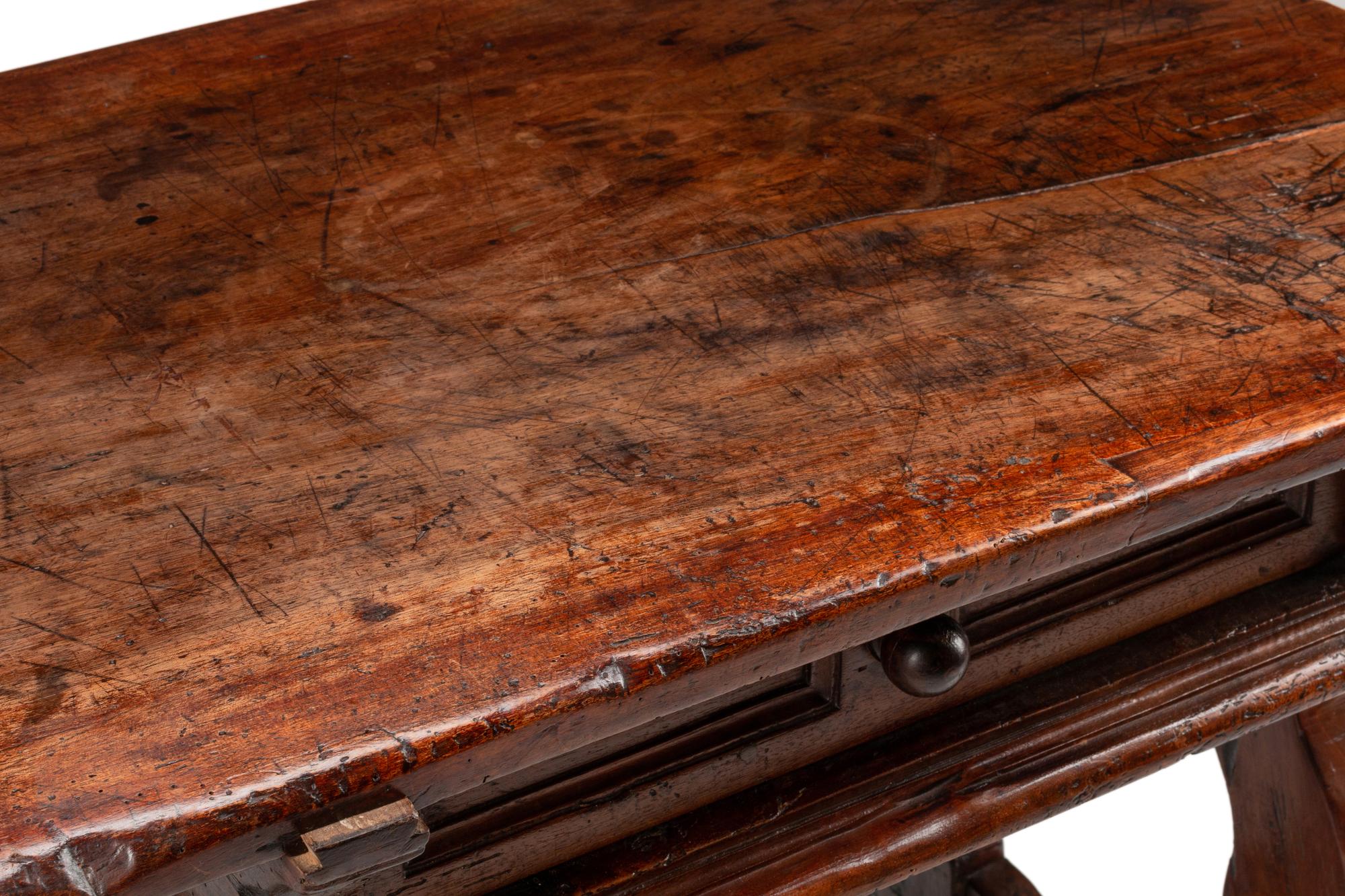 An Italian Baroque Walnut Trestle Table