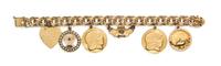A 14 Karat Yellow Gold Charm Bracelet with Six Attached Charms, 43.80 dwts.