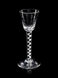 Two Moulded Glass Wine Glasses