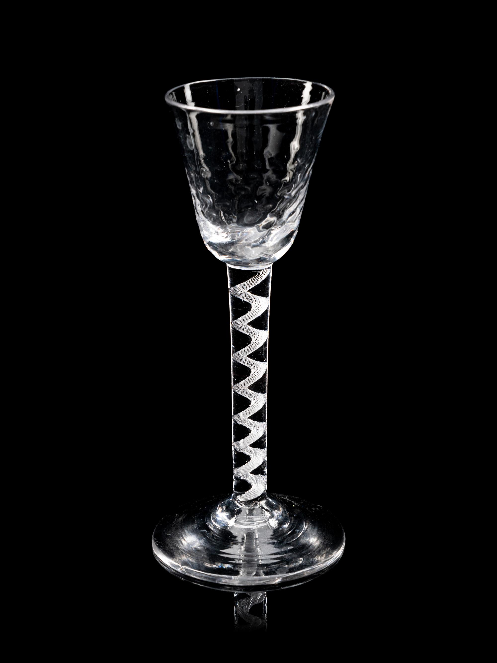 Two Moulded Glass Wine Glasses