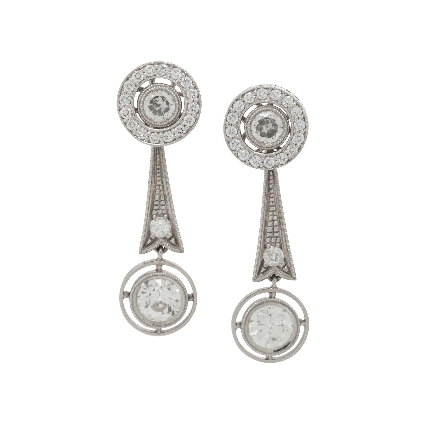 DIAMOND EARRINGS AND EARRING JACKETS