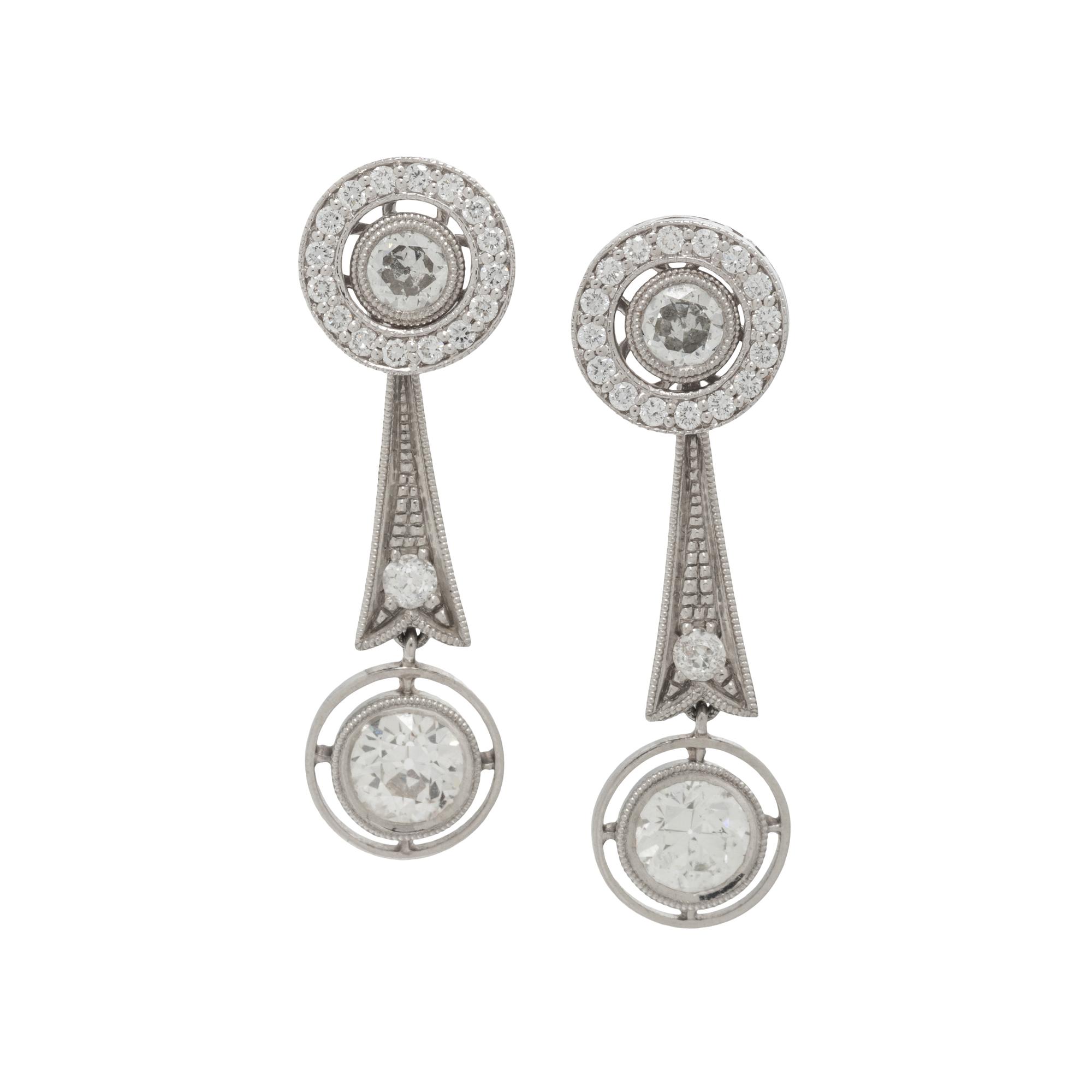 DIAMOND EARRINGS AND EARRING JACKETS