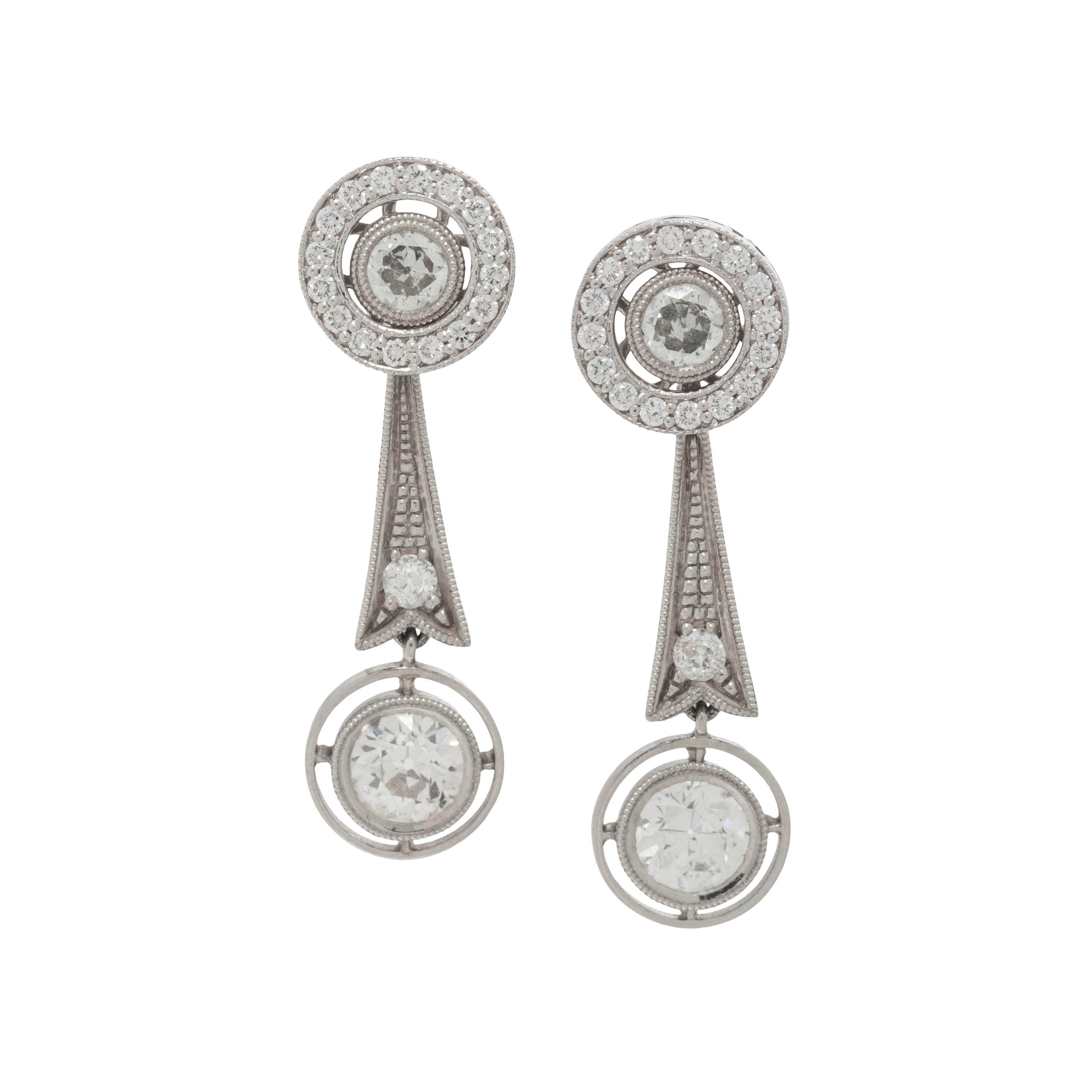 DIAMOND EARRINGS AND EARRING JACKETS