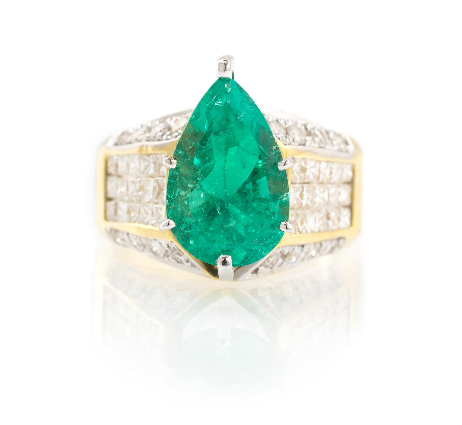 An 18 Karat Yellow Gold, Emerald and Diamond Ring, 7.20 dwts.