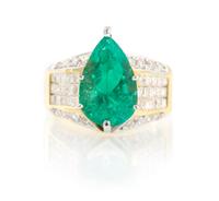 An 18 Karat Yellow Gold, Emerald and Diamond Ring, 7.20 dwts.