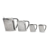 A Group of Four Ercuis Silver-Plate Milk or Cream Pitchers