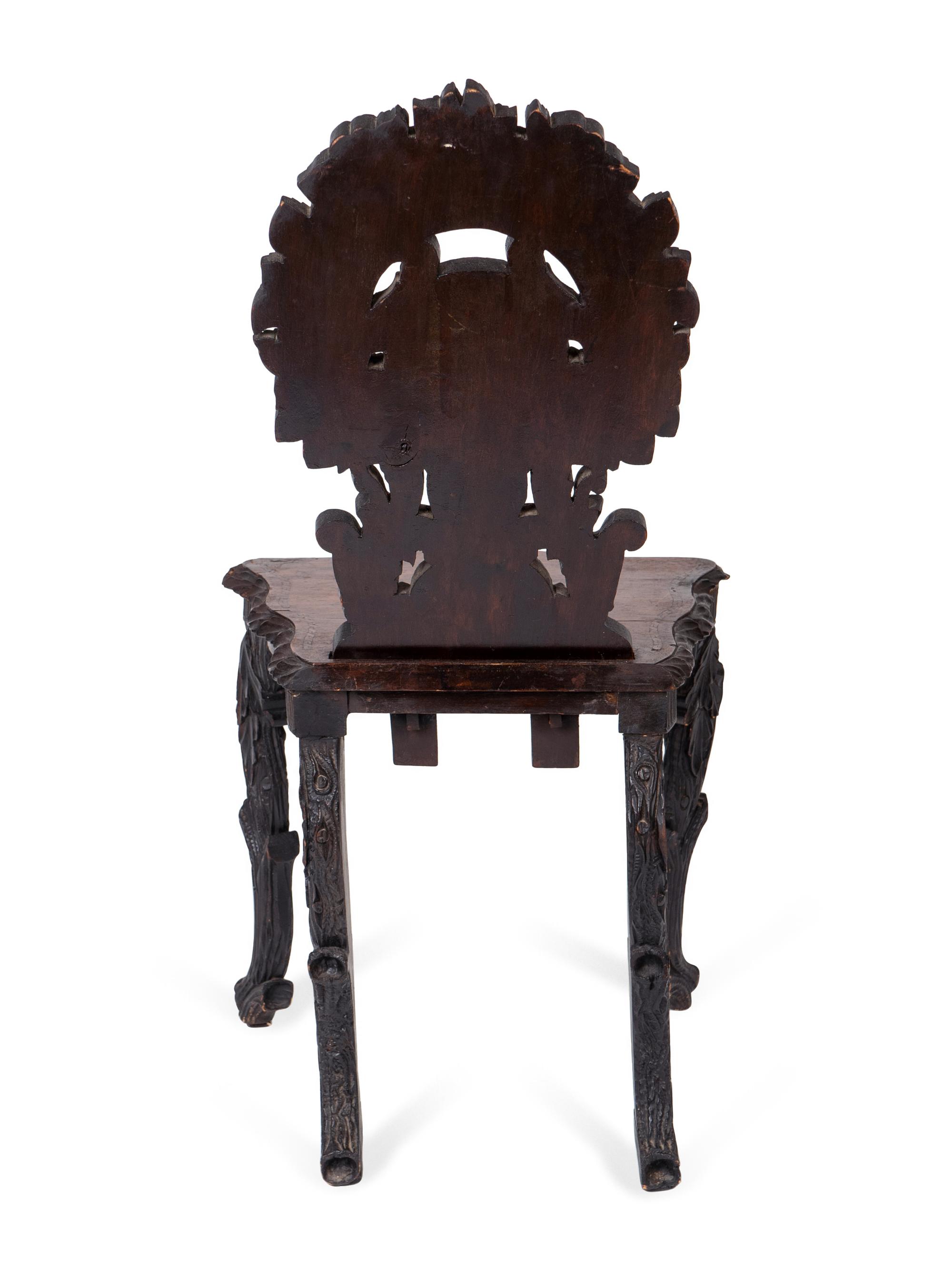 A Victorian Aesthetic Inlaid Hall Chair — 19TH CENTURY