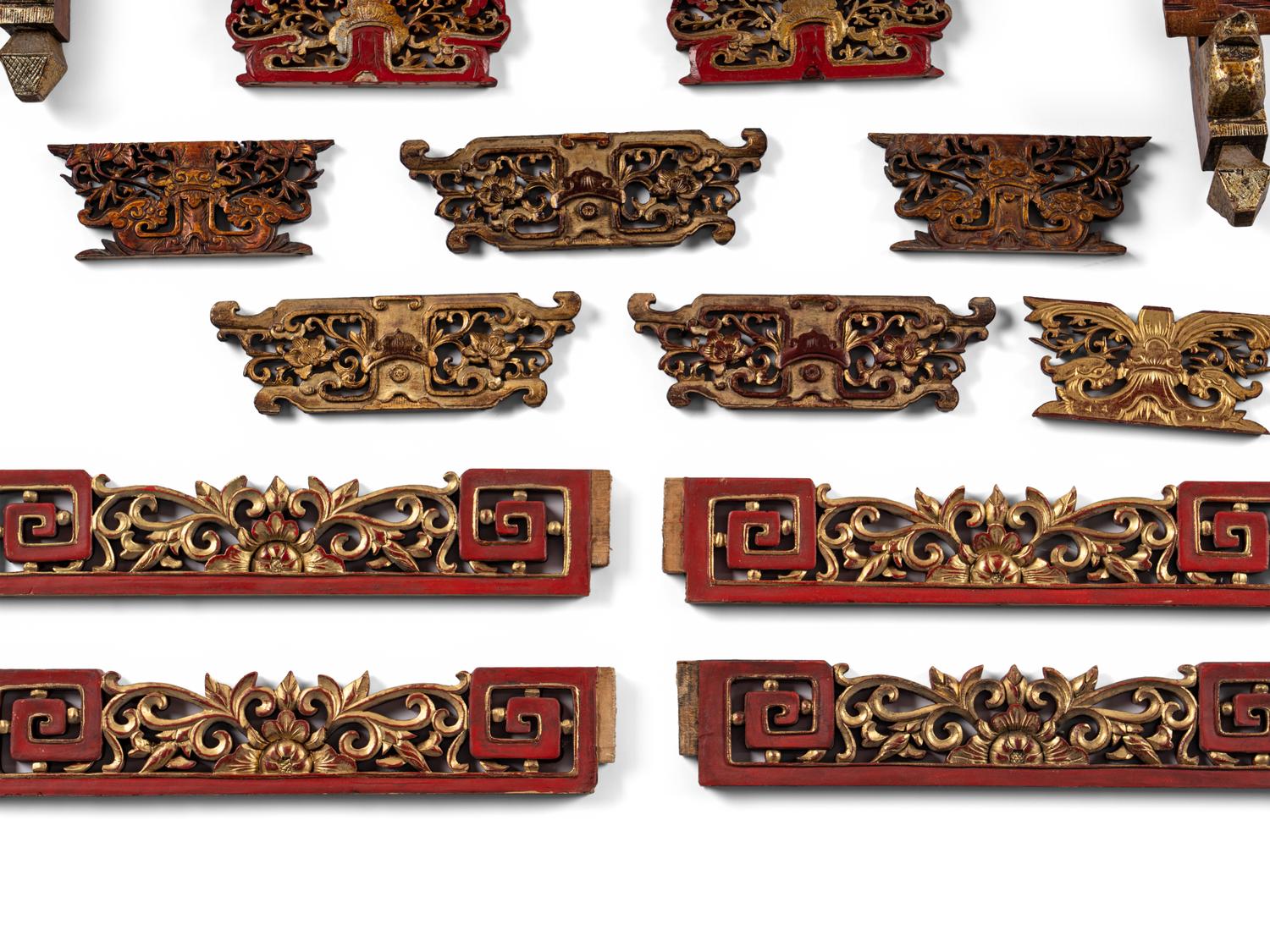 A Group of Chinese Gilt and Red Lacquered Wood Fragments