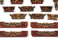 A Group of Chinese Gilt and Red Lacquered Wood Fragments