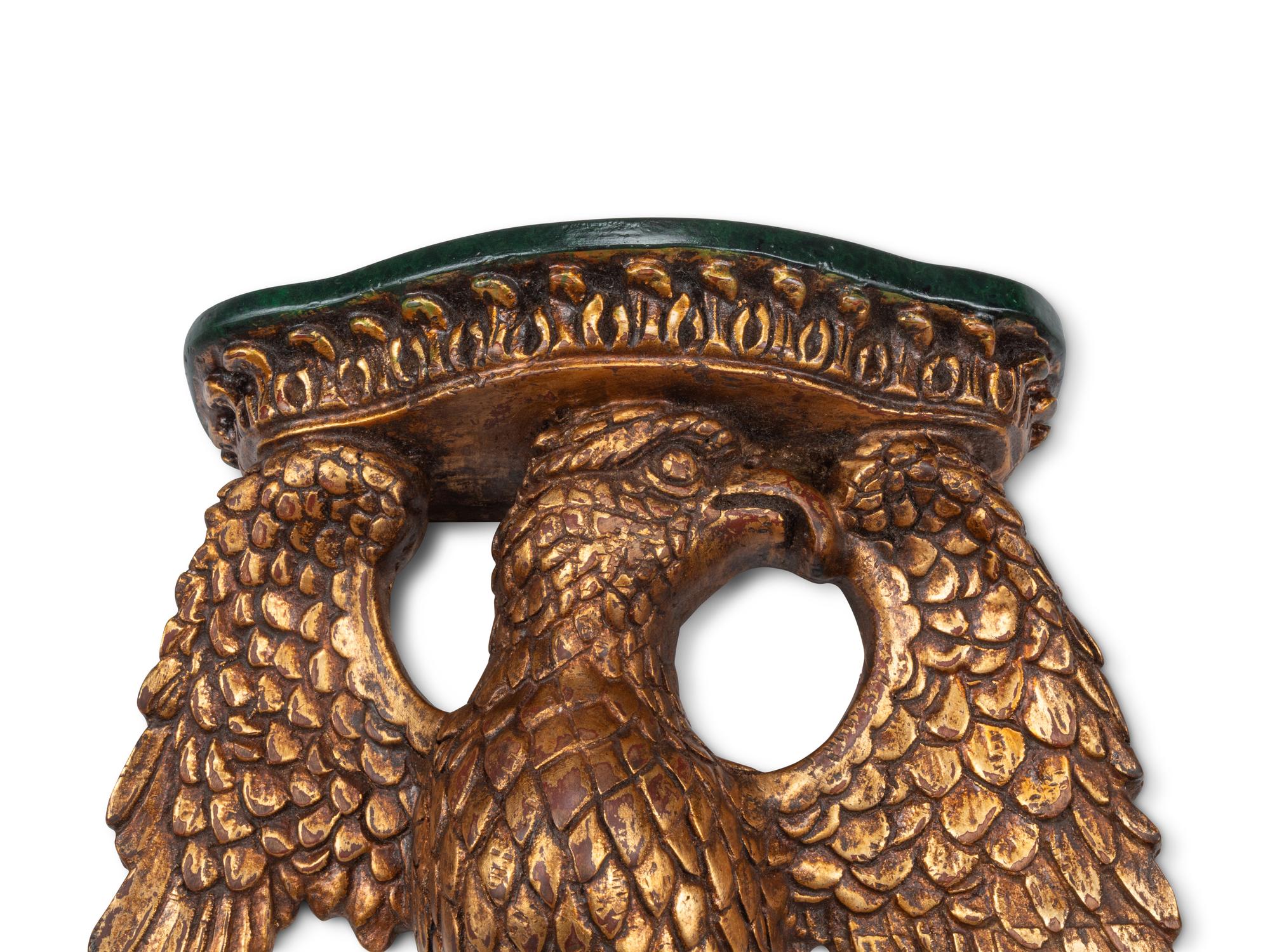 A Set of Four Italian Carved Giltwood Eagle Brackets