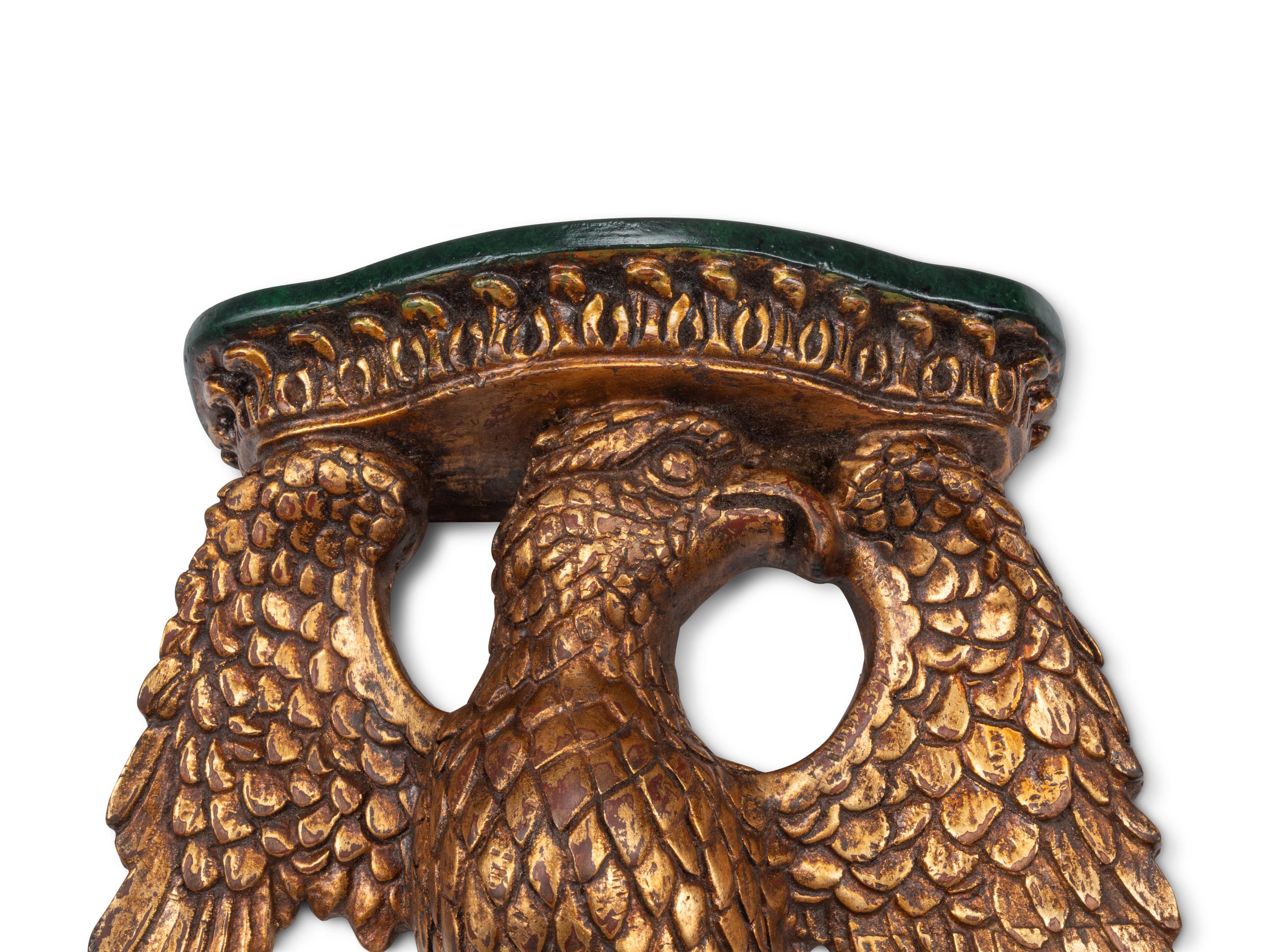 A Set of Four Italian Carved Giltwood Eagle Brackets
