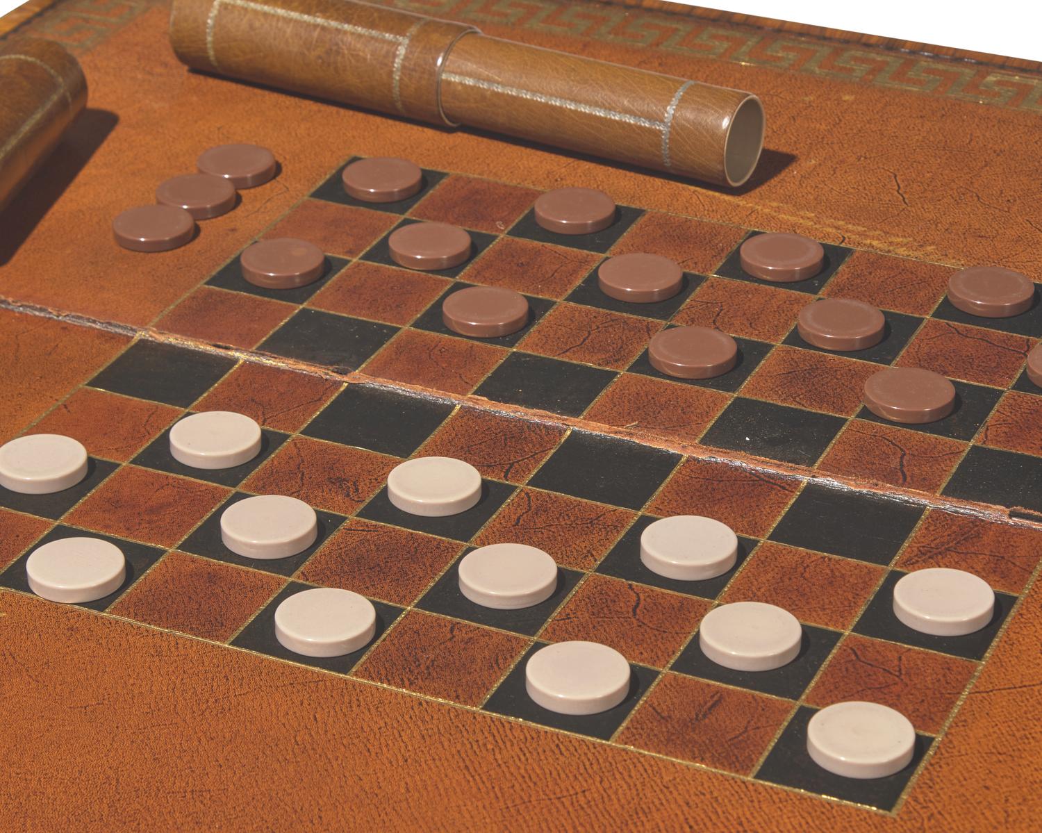 An impressive pair of Regency rosewood and parcel-gilt and ebonized games tables, circa 1820