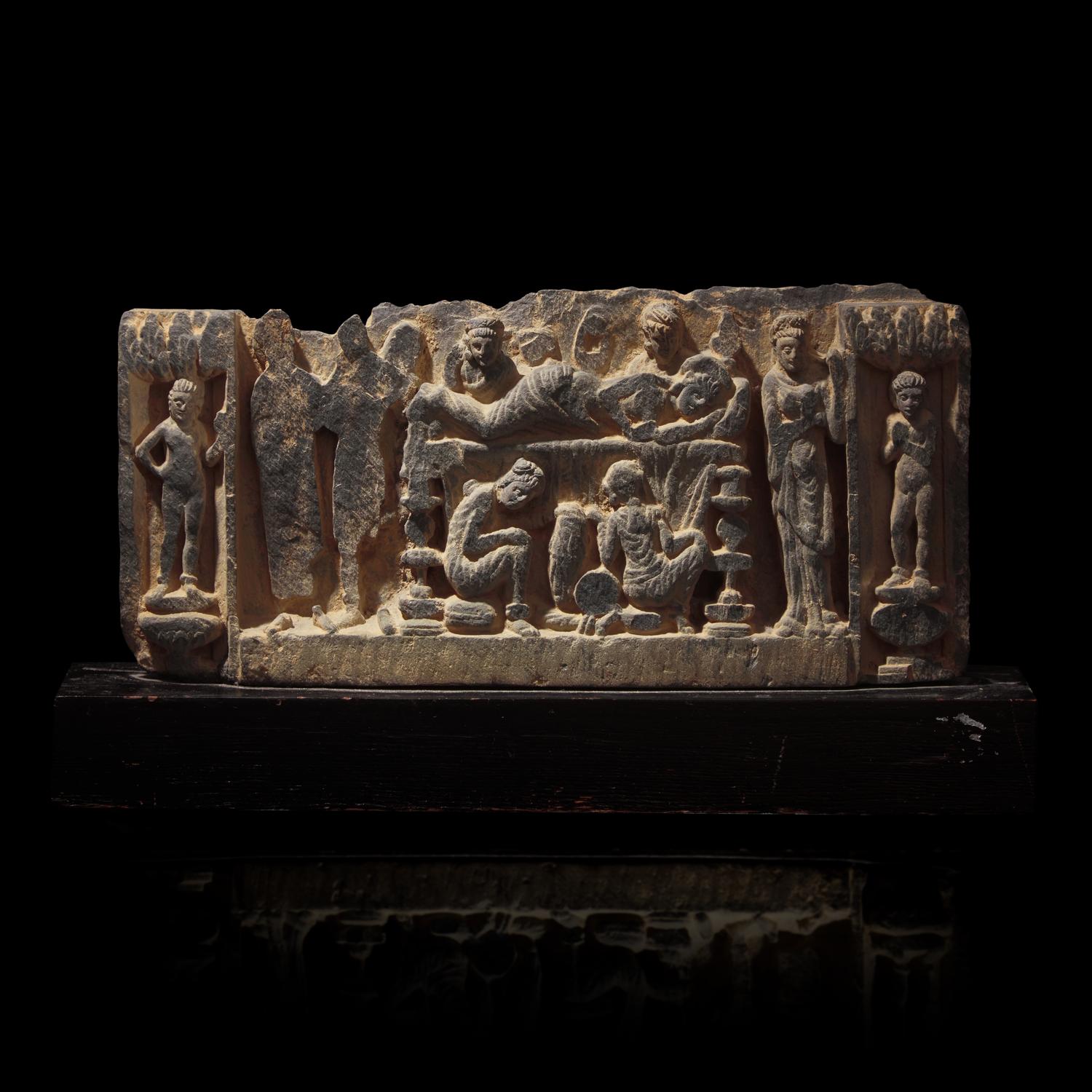 A Gandharan Grey Schist Relief with Maya, 2nd/3rd Century