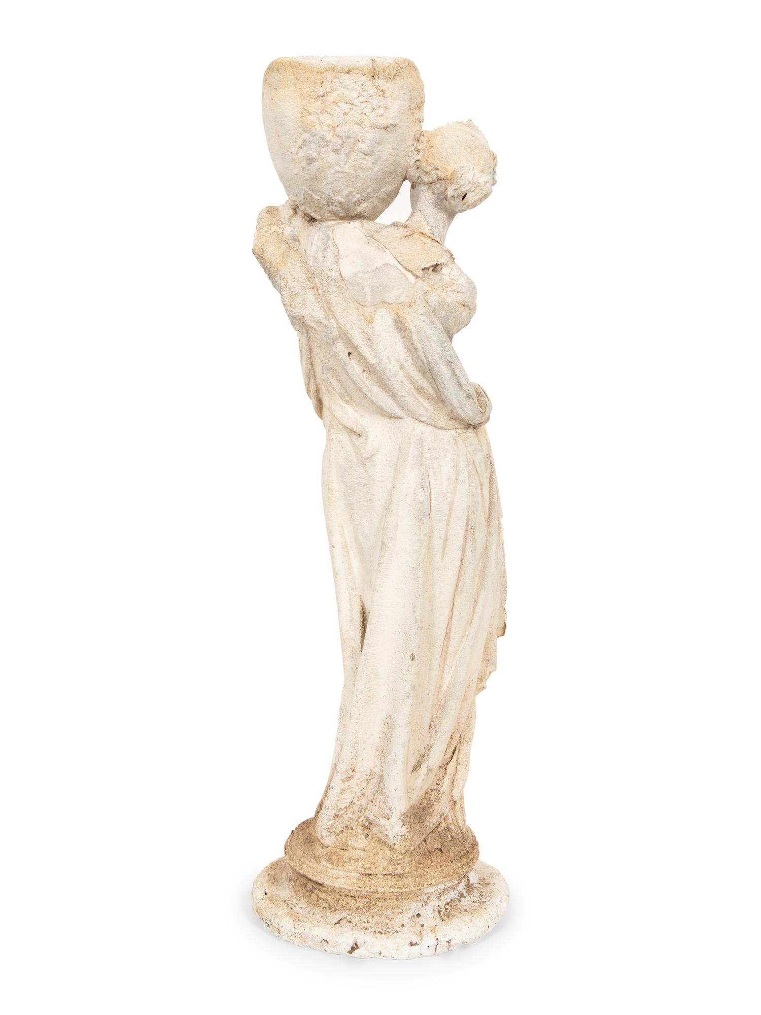 A Cast Composition Figure of a Water Maiden