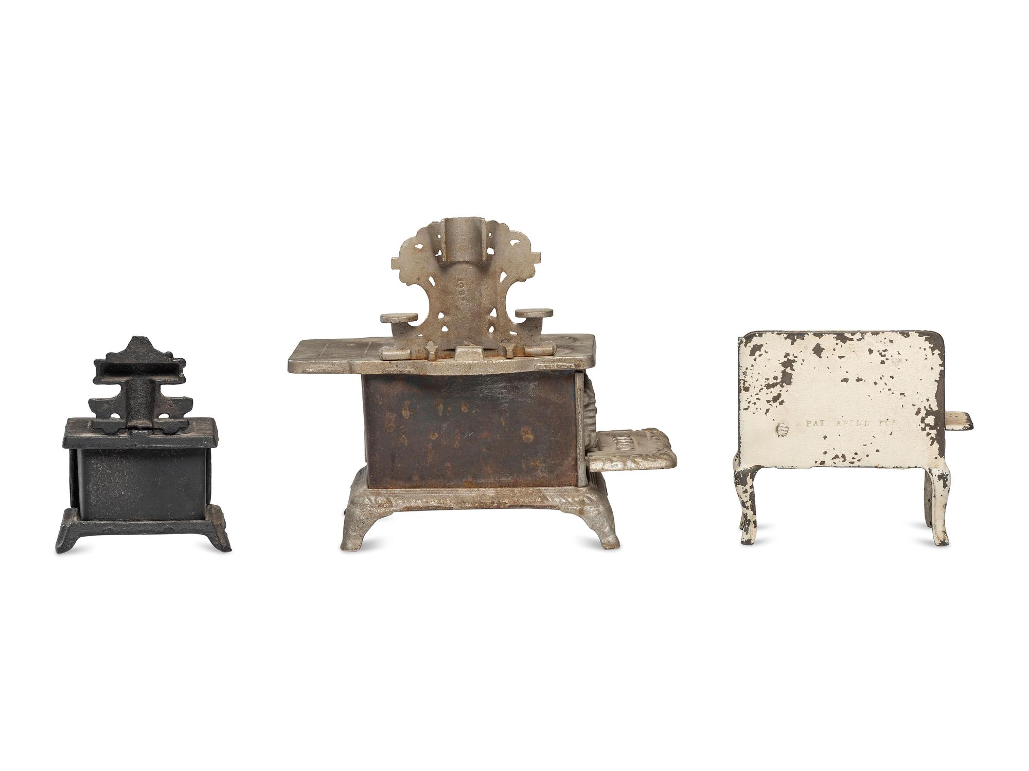 Four Salesman's Sample or Child's Toy Cast Iron Stoves