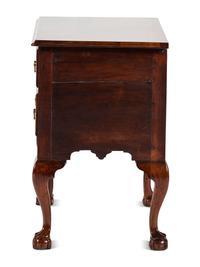 A Chippendale Carved and Figured Walnut Claw-and-Ball Foot Dressing Table
