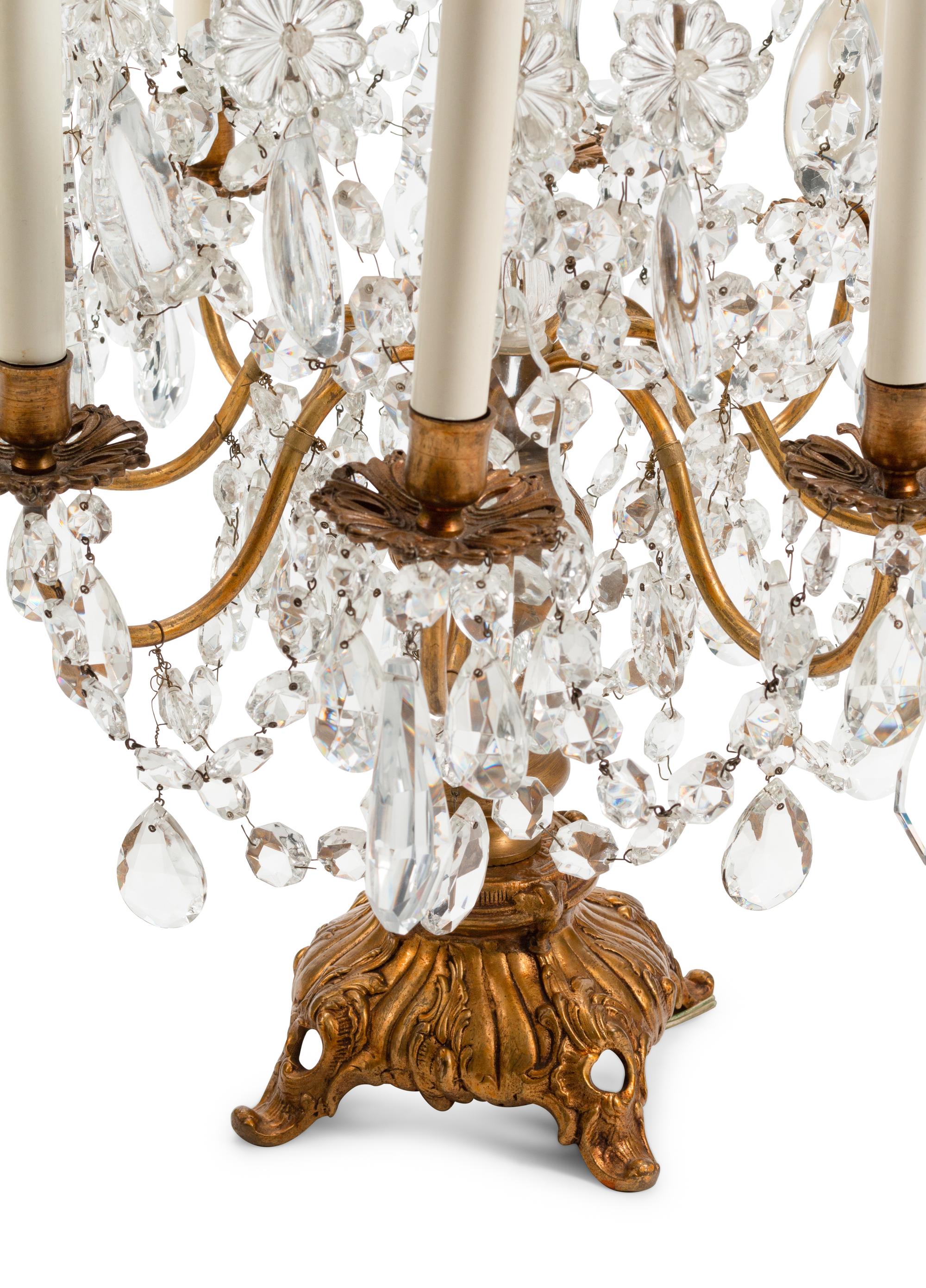 A Pair of French Gilt Bronze and Cut Glass Eight-Light Candelabra