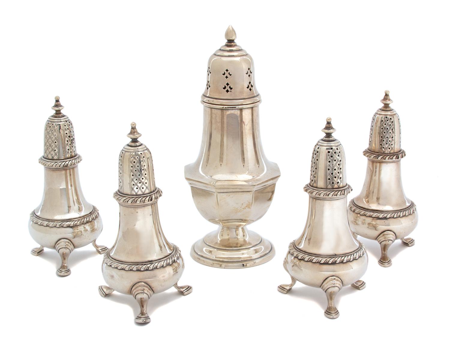 Five American Silver Table Articles, Spaulding & Co. and Reed & Barton, comprising four standing salts and a muffineer