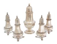 Five American Silver Table Articles, Spaulding & Co. and Reed & Barton, comprising four standing salts and a muffineer
