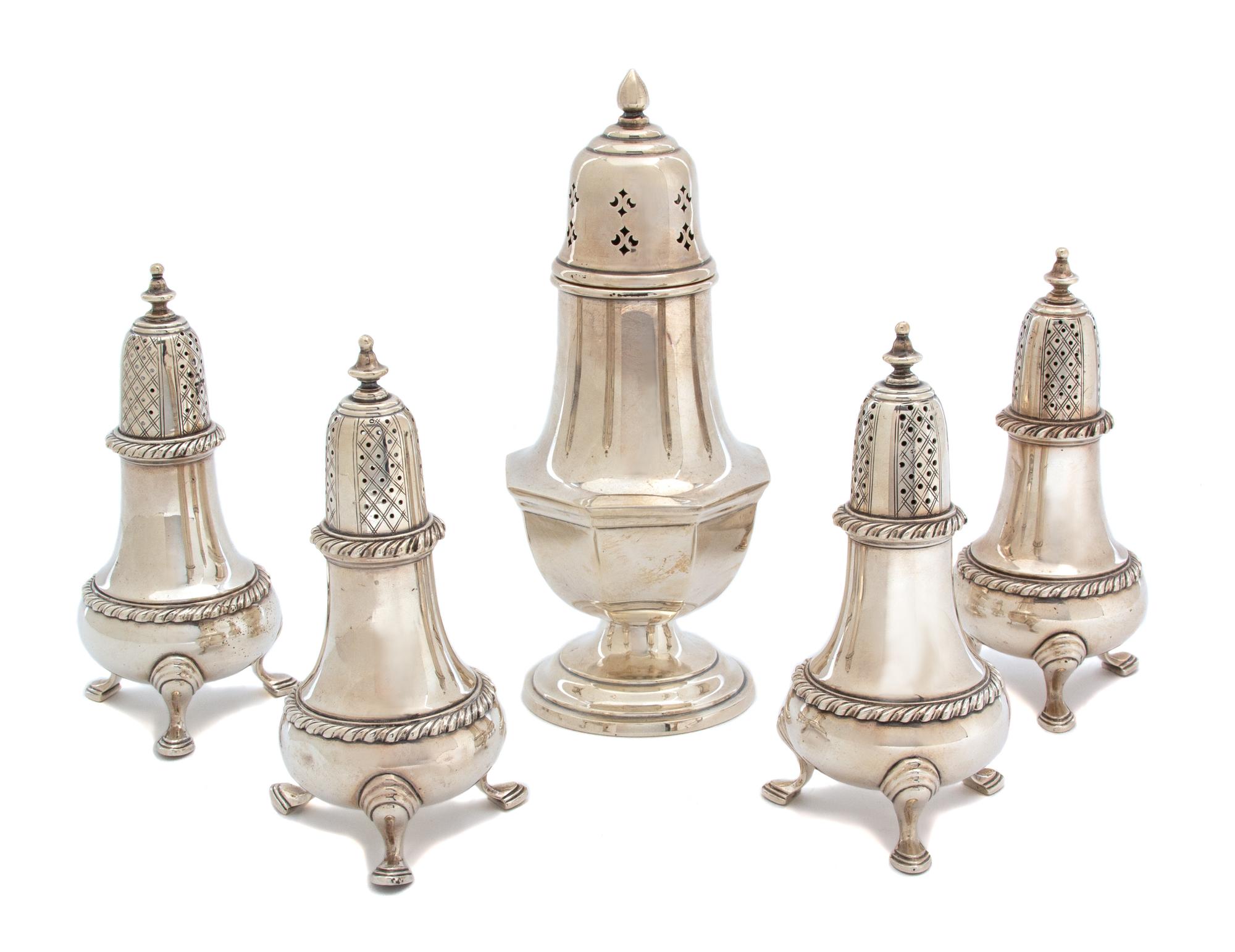 Five American Silver Table Articles, Spaulding & Co. and Reed & Barton, comprising four standing salts and a muffineer