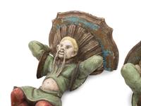 A Pair of Italian Carved and Polychrome Decorated Wood Figural Wall Brackets