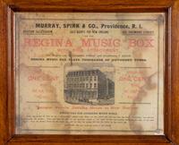 A Regina Coin Operated 15 1/2 Inch Disc Music Box and Stand