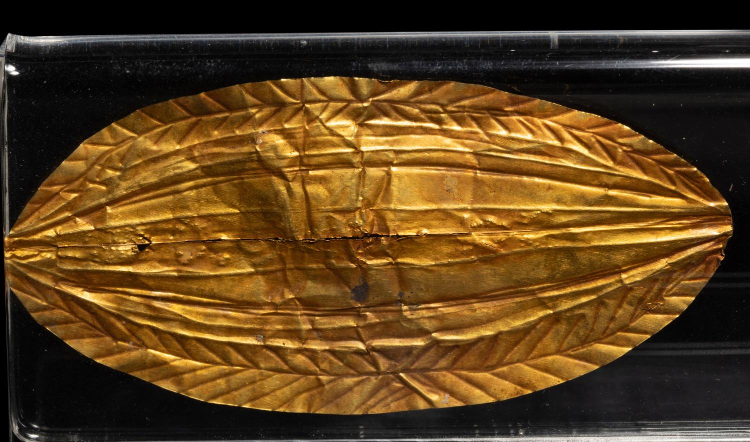 An Egyptian Sheet Gold Mouth Amulet