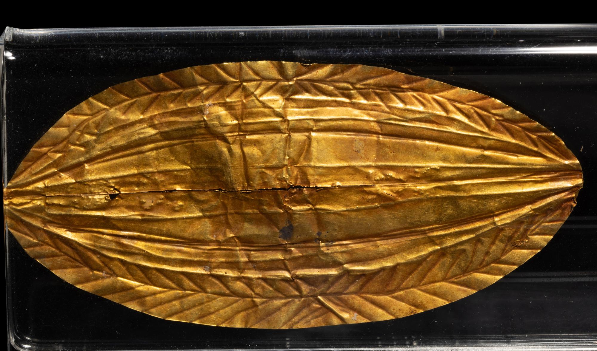 An Egyptian Sheet Gold Mouth Amulet