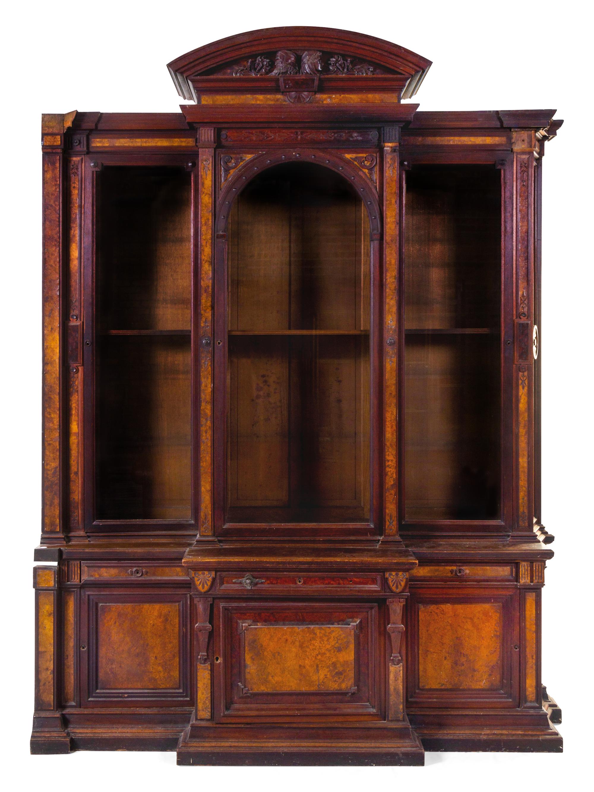 A Pair of Victorian Mahogany and Burlwood Breakfront Bookcases