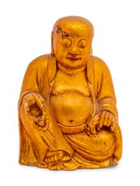 A Chinese Gilt Lacquered Wood Figure of Mile Buddha