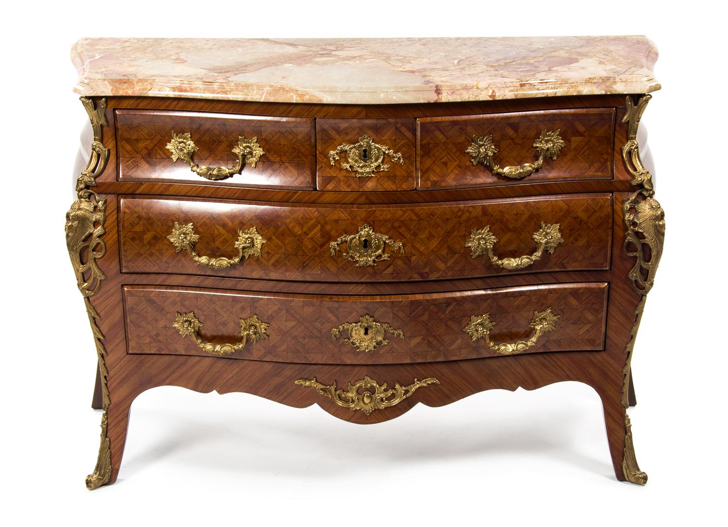 A Regence Style Gilt Bronze Mounted Parquetry Commode en Tombeau EARLY 20TH CENTURY Height 35 1/2 x width 50 x depth 21 inches. — EARLY 20TH CENTURY