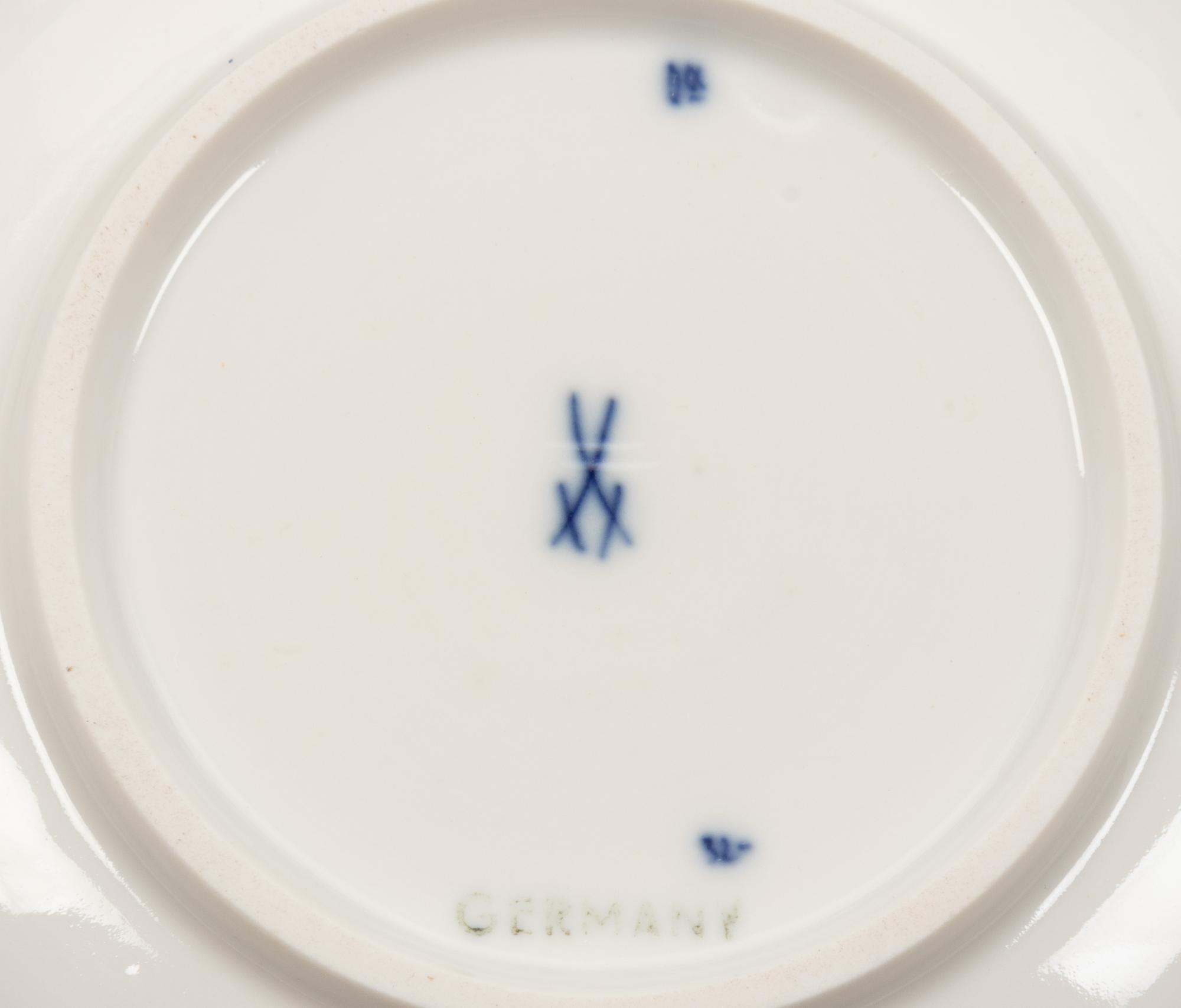 A Meissen Blue Onion Porcelain Dinner Service