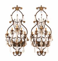 A Pair of Spanish Iron and Rock Crystal Five-Light Sconces