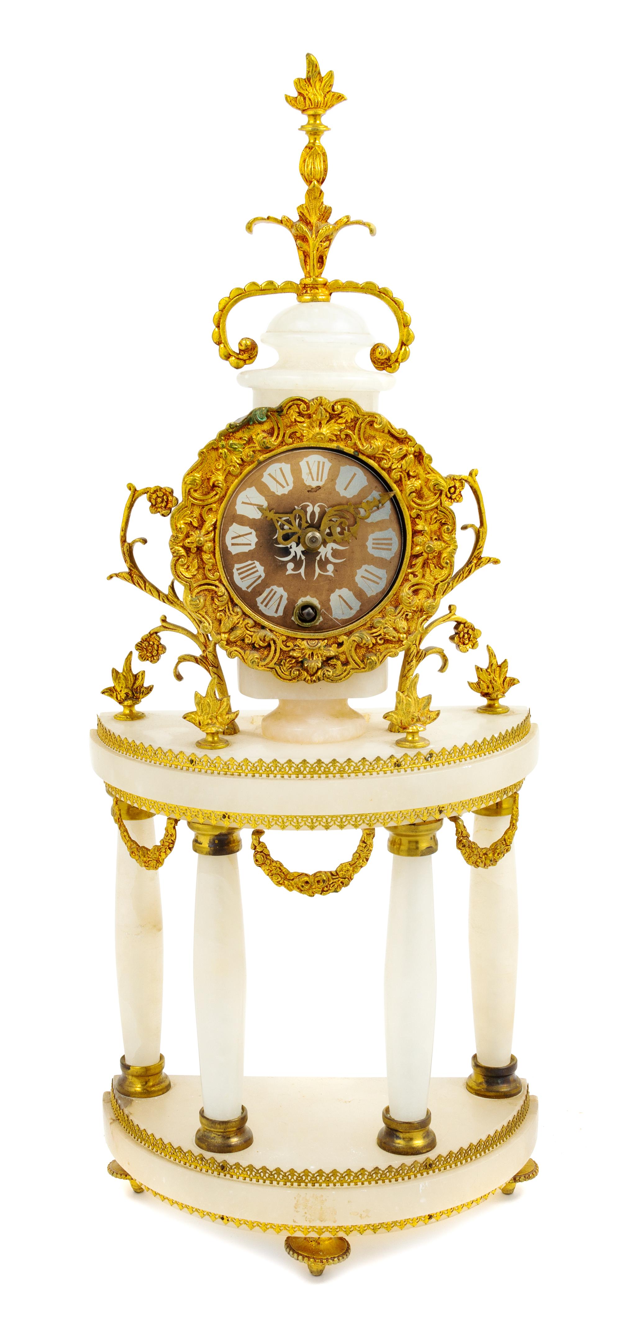 An Italian Gilt Metal and Hardstone Mantel Clock