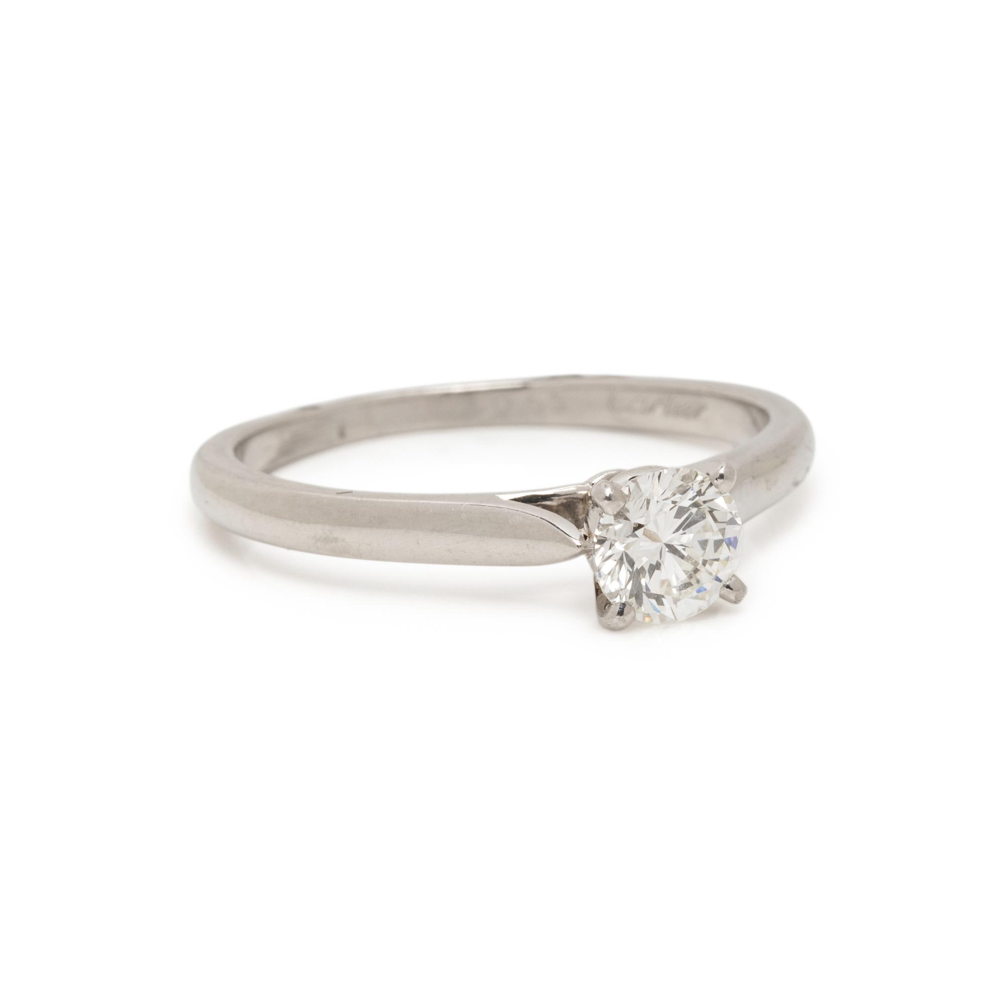 CARTIER, PLATINUM AND DIAMOND RING