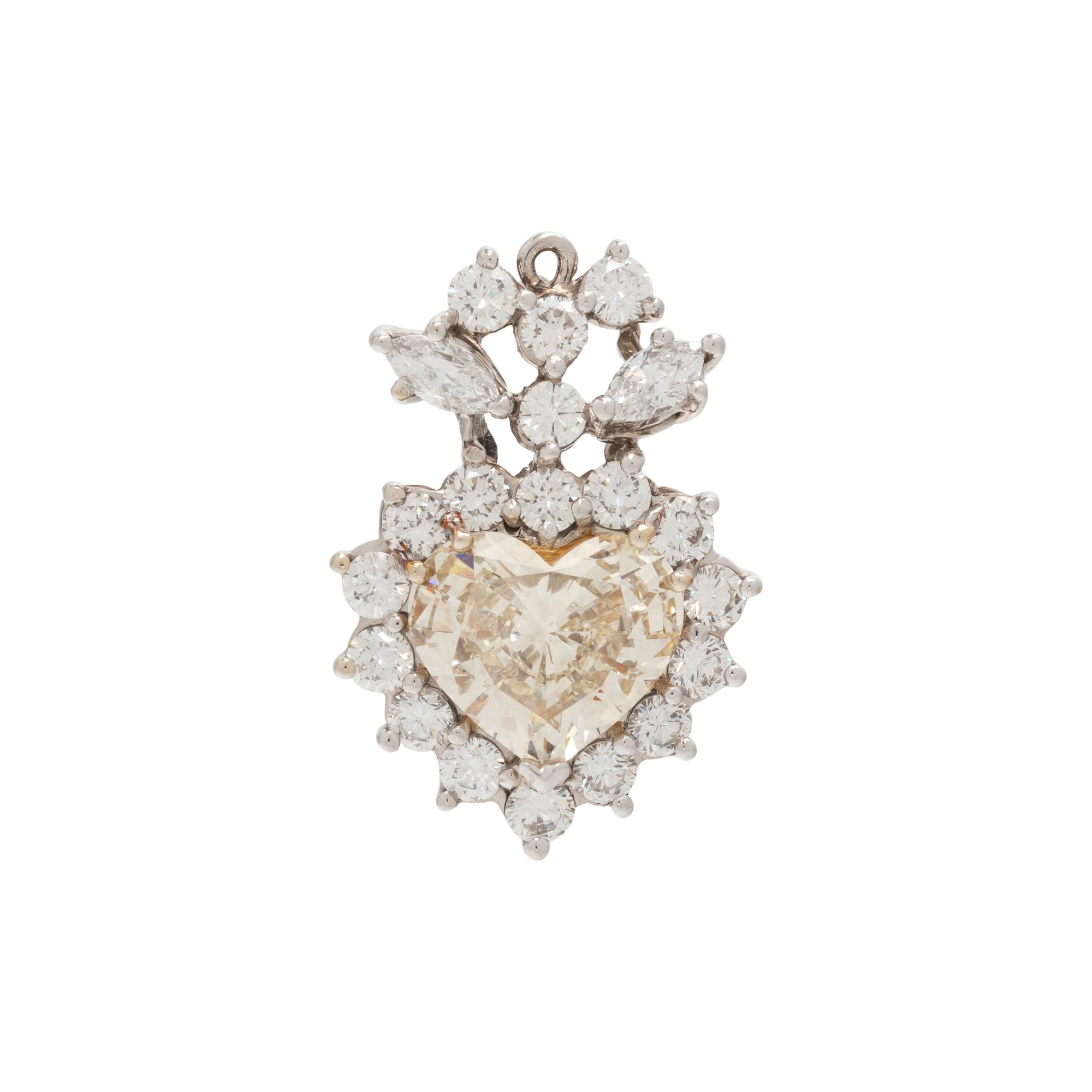 FANCY LIGHT BROWNISH YELLOW DIAMOND AND DIAMOND HEART PENDANT
