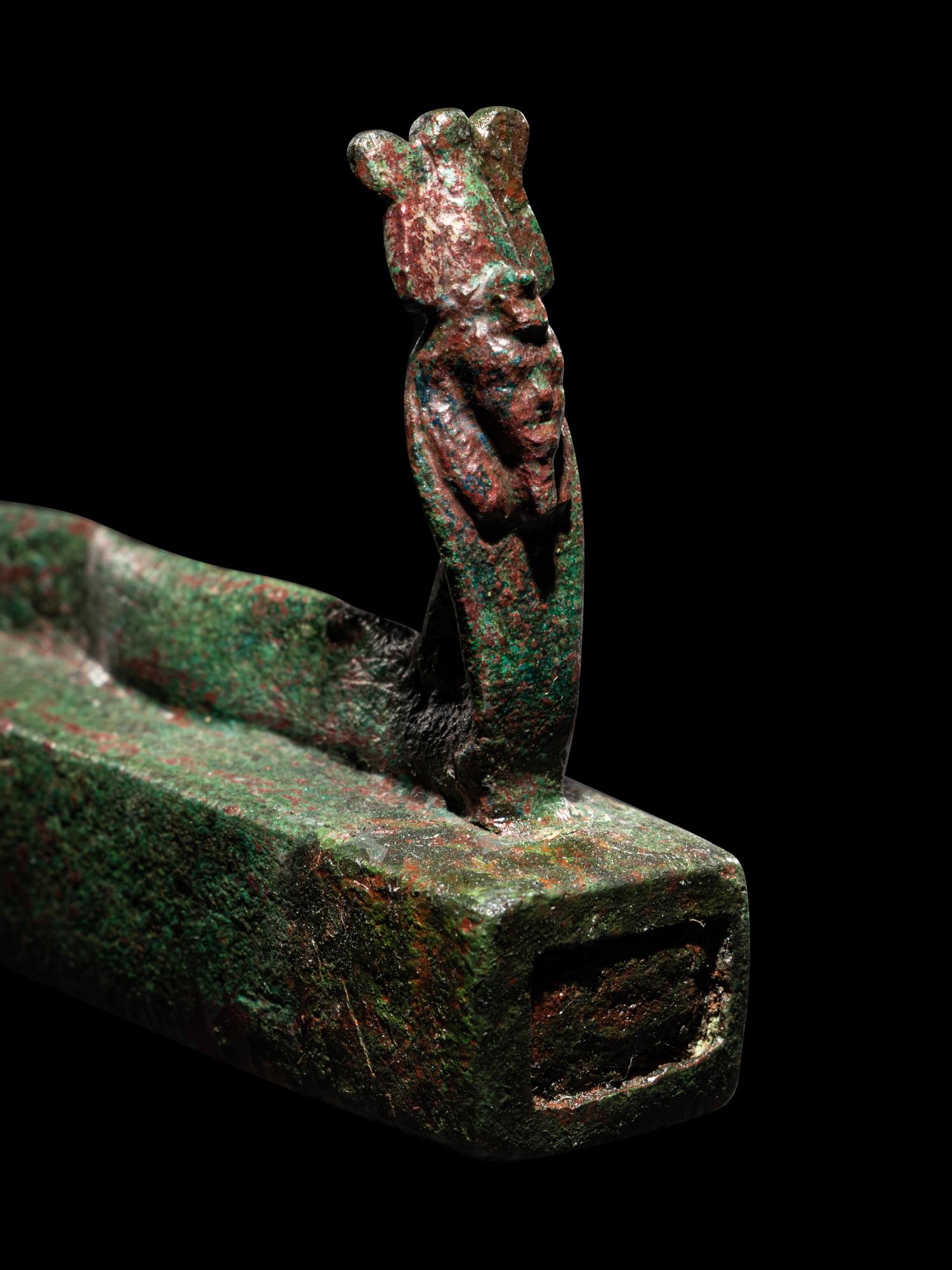 An Egyptian Bronze Snake Coffin
