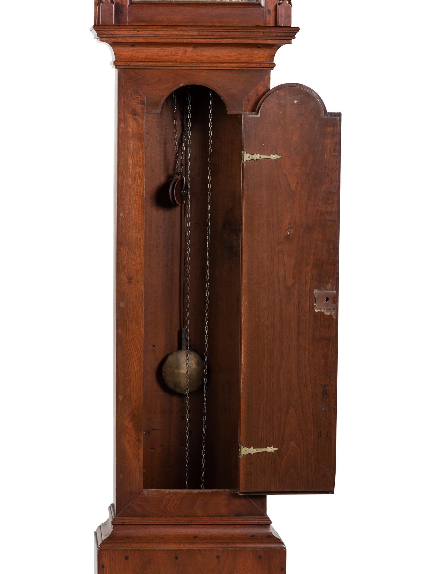 A Queen Anne Walnut Tall Case Clock