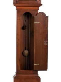 A Queen Anne Walnut Tall Case Clock