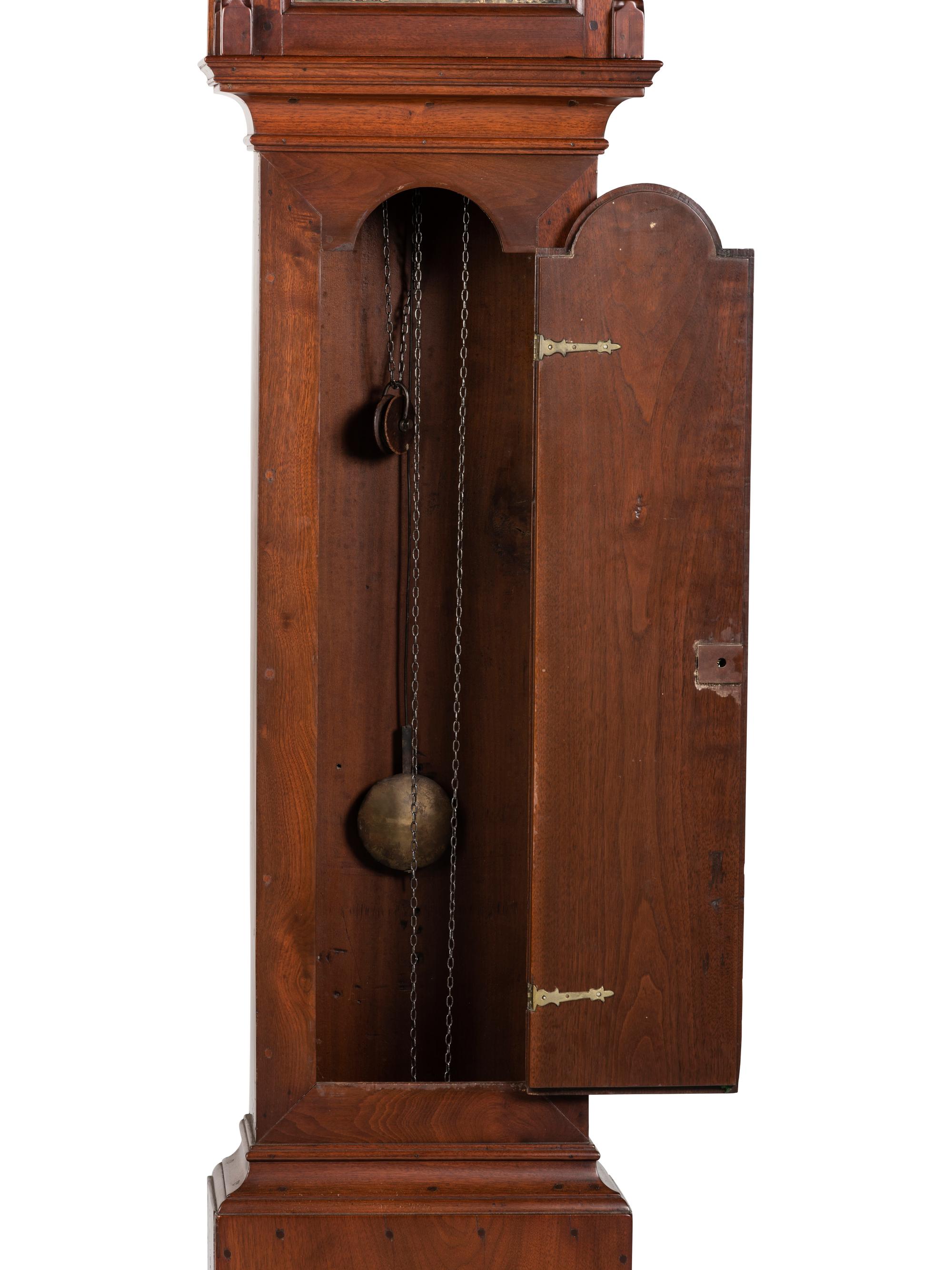 A Queen Anne Walnut Tall Case Clock